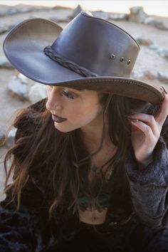 Hollywood | Womens Leather Cowboy Hat This womens leather cowboy hat is the perfect pairing of form and function. Built using durable, finished, 100% leather, it's built to last and protect you from the sun and rain on any adventure. Yet with its curved brim, and all-leather braided band, it's one of our best-looking hats. Winter Glamour, Sun And Rain, Cowgirl Hat, Cowboy Hat, The Sun, Cowboy, Hollywood, Sun, Band