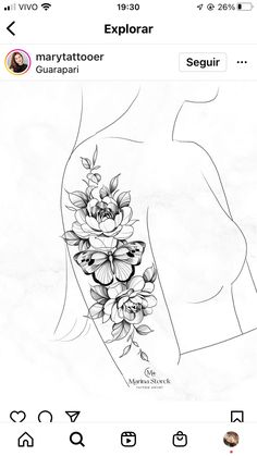 the back of a woman's arm with flowers on it