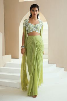 Buy Green Skirt And Choli Georgette Embellished Cape With Draped Set For Women by Seema Thukral Online at Aza Fashions. Draped Skirt With Cape, Drape Skirt Outfit Indian, Cape And Skirt Outfit, Skirt With Blouse Outfit, How To Make Drape Skirt, Draped Skirt Outfit, Indowestern Skirt, Dhoti Skirt Outfits, Drape Skirt Indian