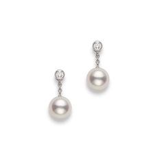 8mm Akoya cultured pearl earrings with 0.16cttw diamonds, set in 18K white gold. Luxury Classic Pearl Earrings With Pendant, Luxury White Gold Diamond Earrings With Akoya Pearl, Luxury Wedding Akoya Pearl And Diamond Earrings, Luxury Timeless Akoya Pearl Earrings, Classic Luxury Pearl Earrings With Pendant, Luxury Pearl Earrings For Wedding With Prong Setting, Luxury White Pearl Earrings With Prong Setting, Luxury Akoya Pearl Bridal Drop Earrings, Mikimoto Earrings