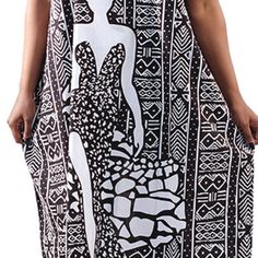 Features A Tradition Black And White Mud Print Design With A Black And White Image Of An African Woman On The Front. The Kaftan Is 54” In Length And Will Fit Up To A 66” Bust. Headwrap Included. 100% Cotton Casual Black Printed Beach Dress, White Printed Maxi Dress For Beach Cover-up, Black Printed Beach Dress Cover-up, Printed Black Maxi Dress For Beach Season, Black Printed Beach Dress For Cover-up, Black Printed Maxi Dress For Vacation, Black V-neck Printed Beach Dress, Black Bohemian Printed Beach Dress, Mesh Wedding Dress