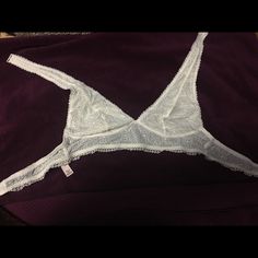 Never Worn. New Without Tags. Halter Bralette White Bra-friendly Low-cut Top, Bra Friendly White Low-cut Top, White Low-cut Bra-friendly Top, Low-cut White Bra For Summer, Victoria's Secret Stretch White Top, Victoria's Secret White Stretch Top, White Stretch Top By Victoria's Secret, White Lace Bra-friendly Top, White Stretch Lace Bra