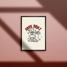 a poster hanging on the wall next to a window with shadow from it's frame