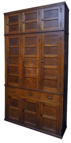 an old wooden cabinet with many drawers