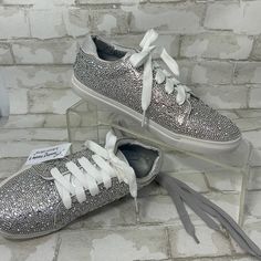 K-Alexa-100 Sneakers Covered With Stunning Silver Rhinestones Are Sure To Be The Most Fashionable Young Lady’s Favorite! Kid’s Collection Comes With An Extra Pair Of Laces. Price Is Firm. Spring Bling Sneakers With Round Toe, Casual Bling Lace-up Sneakers, Party Sneakers With Bling And Round Toe, Trendy Sparkling Lace-up Sneakers, Silver High-top Sneakers With Bling, Silver High-top Sneakers With Rhinestones, Trendy Silver Sneakers With Bling, Trendy Rhinestone Sneakers With Round Toe, Trendy Rhinestone Round Toe Sneakers