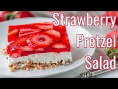 a piece of strawberry pretzel salad on a white plate