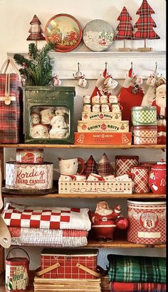 a shelf filled with lots of christmas items