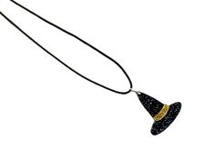 We have started our own line of jewelry, focusing on the spooky aesthetic without the high price tag. This necklace features silver-toned hardware clasp/extender closing a waxed cotton black cord. The pendant is an acrylic witch hat in black and gold sparkle. The chain is 18" around the neck with a 2" extender. Each necklace ships in a black jewelry bag or black jewelry box. Adjustable Black Necklace For Halloween, Adjustable Necklace For Halloween Gift, Adjustable Halloween Necklace Gift, Adjustable Halloween Necklace For Gift, Handmade Adjustable Witchy Necklaces, Adjustable Black Witchy Necklace, Black Adjustable Witchy Necklace, Black Jewelry Box, Spooky Aesthetic