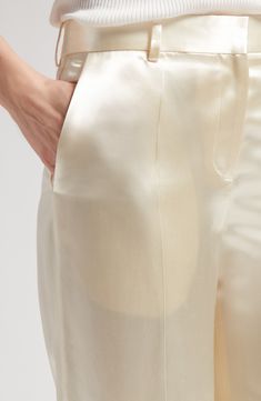 A smooth silk lining lends gliding ease to satin pants designed in a straight-leg silhouette with clean creases and plenty of pockets. 32" inseam; 24" leg opening; 12 1/2" front rise; 17" back rise (size 14) Zip fly with hook-and-bar closure Front slant pockets; back welt pocket 100% viscose Dry clean Made in Italy Designer Clothing Fairy Academia, Silk Dress Pants, Satin Outfit, Pants Satin, Womens Straight Leg Pants, Milk Color, Mood Images, Bead Sewing, Silk Set