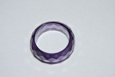 Buyer Will Receive 1 Piece Attractive Purple Amethyst Zirconia Full Faceted Gemstone Made Ring Band.you will really love it.you will gift it to your love ones and friends. Product Details Product Name - Purple Zirconia Gemstone Made Ring Band Gemstone - Zirconia Quantity - 1 Piece ----------------------------------------------------------------------------- THIS BEAUTIFUL ITEM IS AVAILABLE ONLY ON ETSY ------------------------------------------------------------------------------------ Note - Ki Purple Gemstone Round Band Jewelry, Round Purple Amethyst Jewelry, Lavender Crystal Ring Gift, Faceted Amethyst Ring In Purple, Faceted Amethyst Purple Ring, Purple Round Crystal Ring Gift, Purple Faceted Jewelry For Wedding, Purple Cubic Zirconia Round Jewelry, Purple Faceted Amethyst Ring