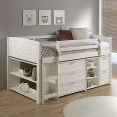 a white bunk bed with drawers underneath it in a child's playroom or bedroom