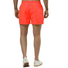 These solid board shorts are the perfect addition to your summer wardrobe. Made of lightweight and soft fabric, they're suitable for beach sport. Wear it with a T-shirt when exercising on the beach to create a sunny and stylish image. The drawstring waist ensures a comfortable fit, and adjustability, while the mesh lining provides additional support. Orange Swim Trunks With Built-in Shorts For Summer, Orange Beachwear Shorts For Summer, Orange Swim Trunks For Summer, Orange Swim Trunks For Beach, Orange Short Swim Trunks For Beach, Sporty Swim Trunks With Built-in Shorts For Summer, Orange Short Length Swim Trunks For Beach, Casual Orange Swim Trunks For Beach, Relaxed Fit Orange Shorts For Beach