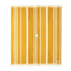 a yellow and white striped towel on a white background