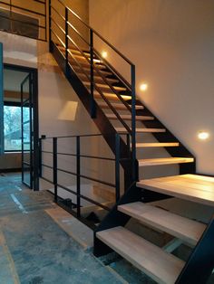 the stairs are made of wood and steel