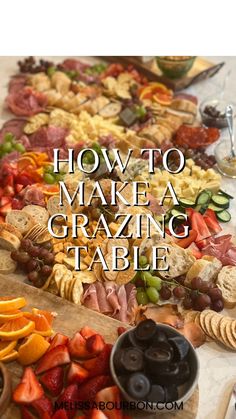 an assortment of food on a table with the words how to make a grazing table