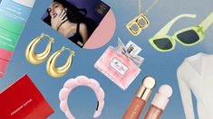 an assortment of women's accessories including sunglasses, lipstick, and perfume bottles on a blue background