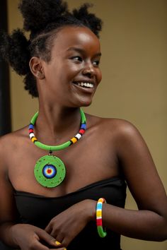 Unique African Maasai Handcrafted Beaded Necklace with an Elegant Look and Brilliant Finish. **GET FREE SHIPPING FOR ADDITIONAL ITEMS PURCHASED. Size(Around the Neck)-16 Inches. Color-Green and Multi-Color. Get a pair of Matching Earrings and 2 Bracelets for an extra $7. Yes, Buy Multiple Items and pay shipping for 1 item only- The rest ships Free. (No Limits on the number of Multiple items). With a faster delivery time of 3 days via DHLExpress, Worldwide. Ordinary/Standard Shipping also availab Traditional Green Beaded Necklaces With Wooden Beads, Traditional Green Beaded Necklace With Wooden Beads, Traditional Green Beaded Necklace With Large Beads, Green Wooden Beads For Festival, Green Wooden Beads For Festivals, Green Wooden Beaded Necklaces For Festival, Traditional Green Beaded Round Necklaces, Artisan Green Beaded Necklaces With Beaded Chain, Unique Green Wooden Beaded Necklaces