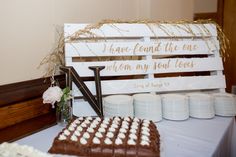 a table topped with cake and desserts next to a sign that says i have found the one from my soul loves