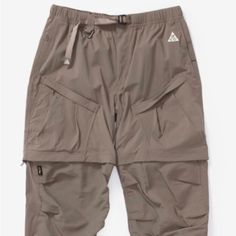 Nike Acg Smith Summit Cargo Pants Shorts Olive Brown Size Xl Or Xxl Dn3943-040 Nwt Outdoor Khaki Pants With Built-in Shorts, Utility Pants With Built-in Shorts For Outdoor, Utility Pants With Built-in Shorts For Outdoor Activities, Khaki Outdoor Pants With Built-in Shorts, Khaki Short Pants For Outdoor Activities, Relaxed Fit Outdoor Trousers, Relaxed Fit Trousers For Outdoor, Khaki Hiking Bottoms With Hip Pockets, Hiking Bottoms With Side Pockets