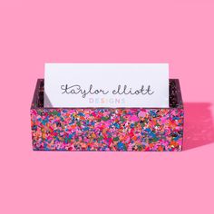 a business card holder with confetti sprinkles