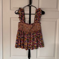 Urban Outfitters Floral Top Size Medium. Never Worn. In Great Condition. Pit To Pit 14.5”, Length 22”. No Trades, Ships Same Or Next Day Urban Outfitters Blouse For Vacation In Spring, Urban Outfitters Spring Vacation Blouse, Urban Outfitters Blouse For Spring Vacation, Fitted Sleeveless Top With Ditsy Floral Print, Multicolor Ditsy Floral Print Tops For Vacation, Multicolor Ditsy Floral Print Blouse For Day Out, Casual Multicolor Blouse With Ditsy Floral Print, Urban Outfitters Tops With Floral Print For Day Out, Urban Outfitters Floral Print Tops For Day Out