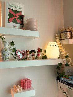 shelves with figurines and decorations on them