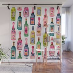 a wall mural with bottles of wine on it