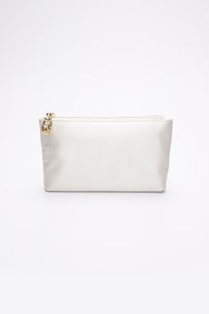 The Mia Clutch with a Ivory Satin Pouch is a chic and elegant acrylic clutch with a modern touch. The exterior is made of the finest Italian acrylic with a beautiful satin zipper pouch interior. Choose from a silver or gold frame to pair perfectly with your preferred metal color. The versatility of The Mia Clutch offers you THREE ways to wear your clutch.Wear it complete with outer acrylic shell and interior zipper pouch or just the acrylic outer shell for a chic peak-a-boo moment or carry just Luxury Rectangular Pouch With Zipper Closure, Luxury Rectangular Pouch With Zipper, Luxury Rectangular Pouch With Zipper Pocket, Luxury Rectangular Clutch With Zipper Pocket, Formal Rectangular Pouch With Zipper Pocket, Luxury Rectangular Clutch With Zipper Closure, Luxury Cream Rectangular Clutch, Modern Formal Clutch With Zipper Pocket, Luxury Cream Rectangular Pouch