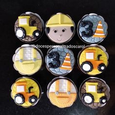 six cupcakes decorated like construction vehicles