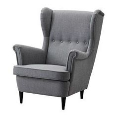 a gray chair with buttons on the back