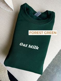 "An ode to Oat Milk...for all my lactose intolerant homies. Customize your \"Oat Milk\" crewneck sweatshirt - 6 colors of crewnecks and 30+ colors of thread to chose from!  Item Overview * Made to order * Handmade item * Ships worldwide from California, United States SIZING Unisex sizing - please reference our sizing chart for specific measurements. If you're looking for an oversized look, we recommend sizing up! SWEATER COLOR Use the dropdown to choose which sweater color you'd like.  THREAD COLOR If you would like a different thread color than the colors in the listing photos, please include it in the personalization tab. We will confirm the thread color with you after your purchase. CARE 💧 Machine wash the garment inside-out and on a cold gentle cycle. Wash with like colors. 🌞 Hang dr Matcha Embroidery, Redbubble Ideas, Hoodie Inspiration, Custom Embroidered Sweatshirt, Trendy Sweater, Trendy Crewneck, Sweatshirt Trendy, Lactose Intolerant, Sweatshirts Quotes