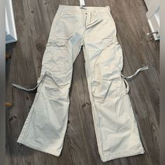 Baggy Streetwear Cargo Pants. Fit Like Size Us 6/ Medium White Casual Cargo Style Bottoms, White Cargo Bottoms For Spring, Casual High Waist White Cargo Pants, Casual White Cargo Pants For Spring, White Cargo Style Bottoms For Spring, White Wide Leg Casual Cargo Pants, Spring White Cargo Style Bottoms, White Casual Parachute Pants For Spring, Casual White Parachute Pants For Spring