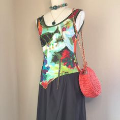 This Dress Displays The Colors And Creativity Of The Maldives Island. The Scoop Neck Knit Tank Top Is Embellished With A Giant Fish, Beading, Ribbons And Studs, And Also Includes The Comparable Colors For Land And Sea. The Diagonal Cut Bottom Has A Slight Flared Shape From The Waist And Finishes With A Bi-Level Hem. The Mixture Of Knit And Light Weight Fabrics Are Easy To Care For. This Dress Is Quite Interesting And Is Sure To Attract A Bit Of Attention For The Wearer. Usa Size 6/8 Navy Pencil Dress, Teal Floral Dress, Giant Fish, Dress Display, Maldives Island, Land And Sea, Purple Floral Dress, Asymmetrical Hem Dress, Jersey Knit Dress