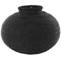 a large black vase is shown on a white background and it looks like it has been made out of rope