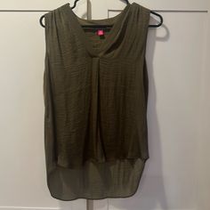 Nwt Vince Camuto Sleeveless Top. Listed As Oasis Green. Fabric Has A Slight Sheen Green Sleeveless Tank Top For Layering, Versatile Beach Tank Top, Green Sleeveless Vest For Layering, Sleeveless Olive Top For Summer, Casual Sleeveless Olive Tops, Casual Olive Sleeveless Top, Green Stretch Seamless Camisole, Fitted Sleeveless Olive Top, Versatile V-neck Tank Top For Beach