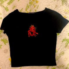 Great Condition Never Worn Black Embroidered Red Dragon Baby Tee One Size Fitted Floral Embroidery Crew Neck Top, Casual Fitted Tops With Embroidered Graphics, Fitted Black Embroidered T-shirt, Fitted Short Sleeve Top With Embroidered Graphics, Trendy Fitted Embroidered T-shirt, Trendy Black Tops With Floral Embroidery, Red Short Sleeve Top With Embroidered Graphics, Casual Red Embroidered Top, Casual Red T-shirt With Floral Embroidery