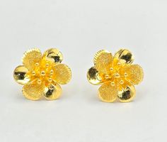 24K gold in all its glory in this bespoke, custom made, designer earrings! One of its kind and available at a great price! Gold: 24K Yellow Gold Style: Designer Weight: 7.90 grams Luxury Yellow Gold Flower-shaped Earrings, Luxury 14k Gold Flower-shaped Earrings, Formal Yellow Flower-shaped Earrings, Yellow Flower-shaped Earrings, Hypoallergenic Yellow Flower-shaped Earrings, Gold Style, Designer Earrings, Jewelry Earrings Studs, Custom Made