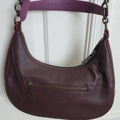 $85. Dark Purple/Plum Colored Hobo Style Purse. Has Shoulder Handle, Adjustable Over The Shoulder Strap, Crossbodystrap. Snake Like Print On Straps. Pictures Don't Do It Justice. Nonsmoking Home. New Without Tags. Was $350 Brand New. I Never Used It. Coach Hobo Bag With Adjustable Strap For Errands, Purple Coach Shoulder Bag With Detachable Handle, Coach Purple Bag With Adjustable Strap, Coach Purple Shoulder Bag With Adjustable Strap, Coach Burgundy Bag With Adjustable Strap, Coach Burgundy Shoulder Bag With Adjustable Strap, Purple Coach Shoulder Bag For Everyday, Coach Purple Bags For On-the-go, Everyday Purple Coach Shoulder Bag