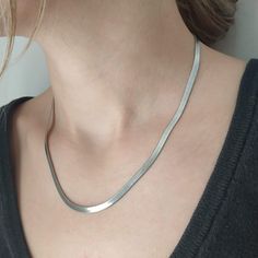 Our delicate stainless steel snake flat necklace is a contemporary necklace that is the perfect complement to your everyday looks. The necklace is of high quality and can accompany every style you choose! It is the perfect gift for you and your loved ones! Very elegant, yet minimalistic, our necklace is the perfect gift for special occasions such as weddings, birthdays, anniversaries, and holidays, and also a unique proposal for your loved ones, even yourself. Please keep in mind that the neckla Delicate Stainless Steel Snake Chain Necklace, Silver Metal Choker With Snake Chain, Stainless Steel Necklace With Adjustable Snake Chain, Silver Snake-shaped Chain Necklace As Gift, Stainless Steel Tarnish-resistant Snake Chain Necklace, Pig Earrings, Wood Resin Necklace, Hammered Bracelet, Contemporary Necklace