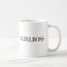 a white coffee mug with the word girlboss on it