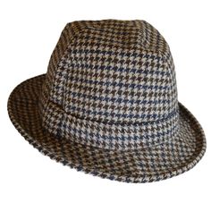 Vintage Brown Dogtooth Tweed Trilby - Small 52cm-55cm A vintage trilby hat in brown and blue dogtooth tweed fabric, with a simple hat band and trim with a 4.5mm Brim. This plaid tweed trilby hat has a comfortable fit for head size 52-55cm (see measurements below), is beautifully lined with deep red fabric and with the brand mark of Mayser, plus the initials RH inside the brim. From pre-loved to re-loved, wear it all year around to add some pizazz to your outfit. Perfect as a gift for yourself or Tweed Hats With Herringbone Pattern, Tweed Hat With Herringbone Pattern And Short Brim, Tweed Hat With Short Brim And Herringbone Pattern, Tweed Brimmed Hat With Herringbone Pattern, Classic Tweed Brimmed Hat, Classic Brimmed Tweed Hat, Tweed Herringbone Short Brim Hat, Classic Tweed Hat With Curved Brim, Classic Tweed Hat With Short Brim