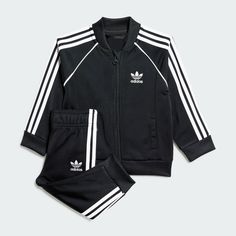 adidas Shop the Adicolor SST Track Suit Kids - Black at adidas.com/us! See all the styles and colors of Adicolor SST Track Suit Kids - Black at the official adidas online shop. Adidas Sporty Tracksuit For Sports, Black Tracksuit For Spring Sportswear, Black Spring Tracksuit Sportswear, Sporty Adidas Tracksuit, Adidas Sporty Long Sleeve Tracksuit, Sportswear Tracksuit With Three Stripes For Streetwear, Three Stripes Tracksuit For Streetwear, Streetwear Sportswear Tracksuit With Three Stripes, Casual Adidas Tracksuit For Sports