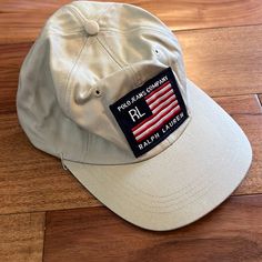 Brand: Ralph Lauren Polo Jeans Company Style: Baseball Hat /Cap Size: One Size - Adjustable Color: Tan With Red/White/Blue Logo Comes From A Smoke-Free, Poodle Friendly Home Condition: Preowned But Never Worn. Has Been In Storage So Some Wrinkles As Shown In Picture Hat Is From Mid To Late 90’s. Came From Younkers Department Store Back In The Day Ralph Lauren Hat, Ralph Lauren Hats, Polo Hat, Polo Jeans, Blue Logo, Vintage Polo, Baseball Hat, Hat Cap, Red White Blue