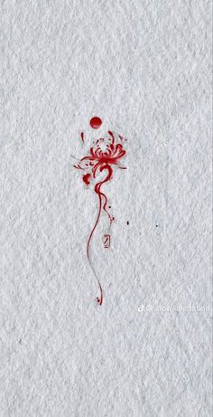 a red ink splattered on white paper