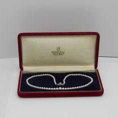 Mikimoto Sterling silver Pearl Necklace with Box Pearl The necklace is 16.25in Length Pearls are white cream-colored pearls ranging from 3.9mm to 7.3mm Comes with Box Item Number 1035 Classic Pearl Necklace Gift, Classic Pearl Necklace As A Gift, Classic Pearl Necklace With Round Beads, Classic Pearl Necklace With Round Beads As Gift, Classic Single Strand Pearl Necklace Gift, Classic Single Strand Pearl Necklace As Gift, Classic Akoya Pearl Necklace As Gift, Vintage White Akoya Pearl Jewelry, Classic Pearl White Pearl Necklace As Gift