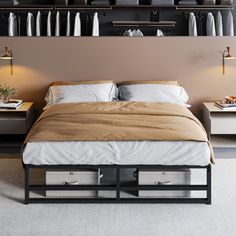 a bed with two drawers underneath it in front of a wall filled with shelves and lamps