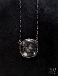 ( Spiderweb necklace, real cobweb resin, spiderweb pendant, caught in resin, circle necklace, gothic necklace, captured in resin, spider web preserved, rustic goth pendant, statement necklace, golden ratio cobweb, magnifying glass, rustic soldered ) This is real spiderweb pendant. It's completely handmade, in three dimensional circle shape pendant, on long gunmetal chain. Pendant is transparent and spiderweb looks the best on black clothes, it's very vibrant and made with love although is stolen from a spider (but spider wasn't harmed nor were other insects). Pendant is made with high quality non-yellowing resin. You will recieve exact product as it's in the picture. Dimensions of pendant are: 3 cm x 3 cm Necklace length (chain + pendant, height from top to bottom) is: 42 cm Length of chai Spiderweb Necklace, Spider Web Necklace, Goth Pendant, Necklace Gothic, Black Clothes, Gothic Necklace, Golden Ratio, Handmade Box, Circle Necklace