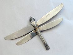 three knives sitting on top of each other with the words diffunctional designs blogpot com