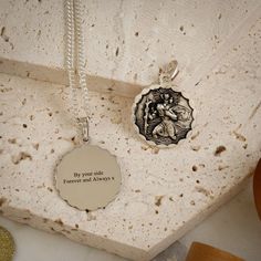 This traditional styled St Christopher medal is finished with a gentle ellipse shaped border.  Made using the traditional iconic image of the legendary patron saint carrying the child Christ across the sea it can be engraved on the back with a name and date, destination or personal message. Hand polished with your choice of finish - contemporary matte, polished or antique styled blackened image. Choose the chain to suit you - a trace chain makes a good women's st Christopher pendant, and a chunk Ellipse Shape, St Christopher Necklace, St Christopher Medal, St Christopher Pendant, Handwriting Styles, Compass Pendant, Silver Necklaces Women, St Christopher, Saint Christopher