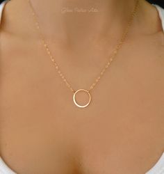 "Dainty and pretty circle necklace - 100%Sterling Silver, 14k Gold Fill or Rose Gold Fill A beautiful minimalist necklace for yourself or someone you love.... This handmade necklace makes the perfect gift. ~ Dainty chain is available in 14k gold fill, rose gold fill or sterling silver ~ Infinity circle is lightly hand hammered and measures 17mm ~ Total necklace length includes circle and is shown in picture is 18\" - Choose your favorite length ~ Necklace closes with a sterling silver, 14k gold Infinity Necklace Gold, Eternity Necklace, Small Necklace, Length Necklace, Circle Pendant Necklace, Infinity Necklace, Circle Of Life, Circle Necklace, Necklace Dainty